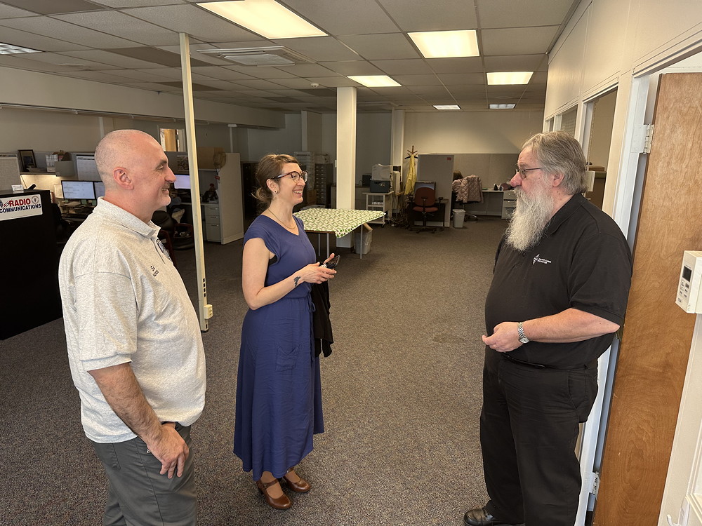 Rosy Schechter, KJ7RYV, chatting with Ed Wilson, M17, and Mike Walters, W8ZY, American Radio Relay League (ARRL) Field Service Manager