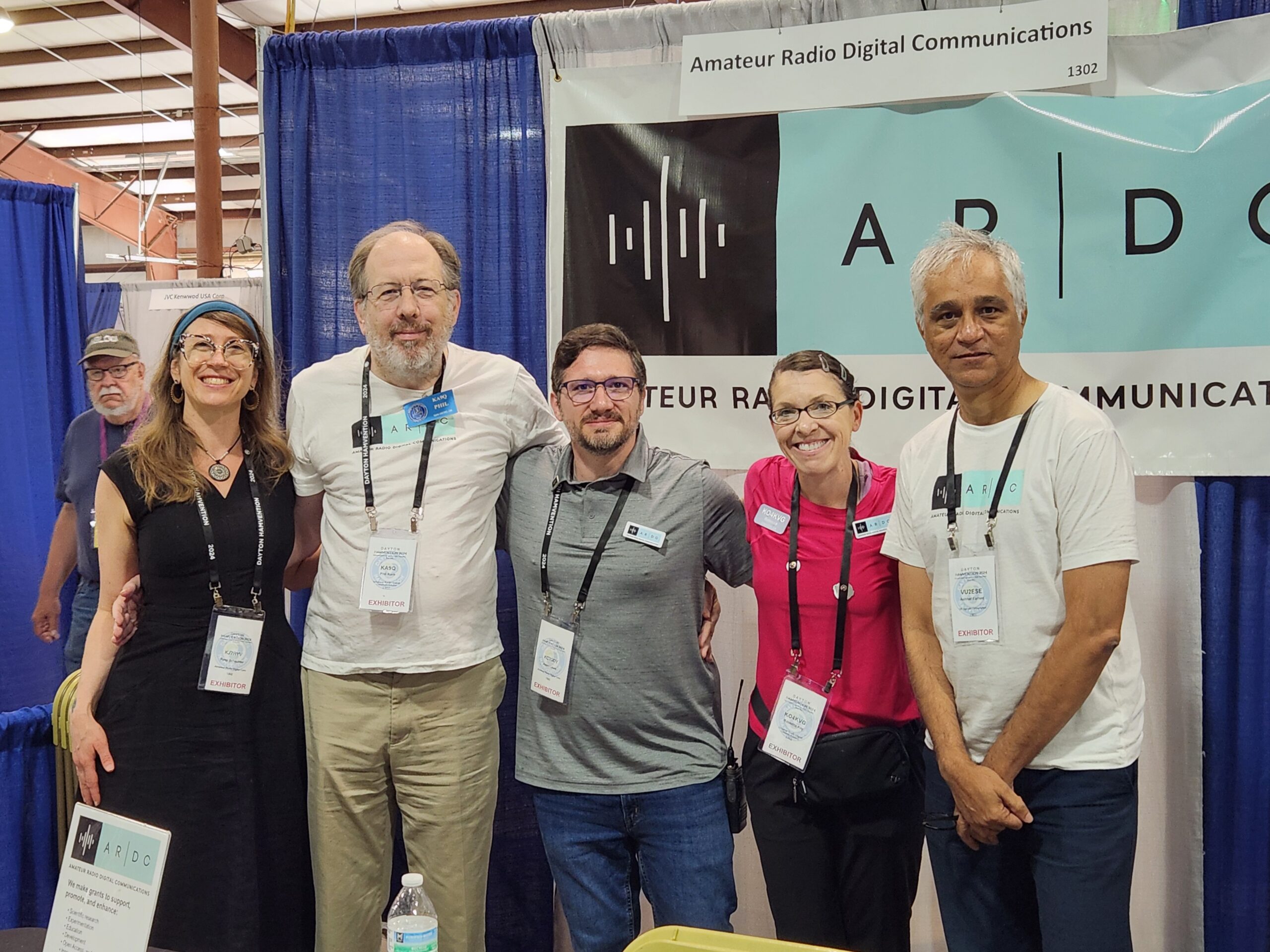 Rosy Schechter (KJ7RYV), Phil Karn (KA9Q), Adam Lewis (KC7GDY), Rebecca Key (KO4KVG), and Ashhar Farhan (VU2ESE) at the ARDC Booth, Hamvention 2024.