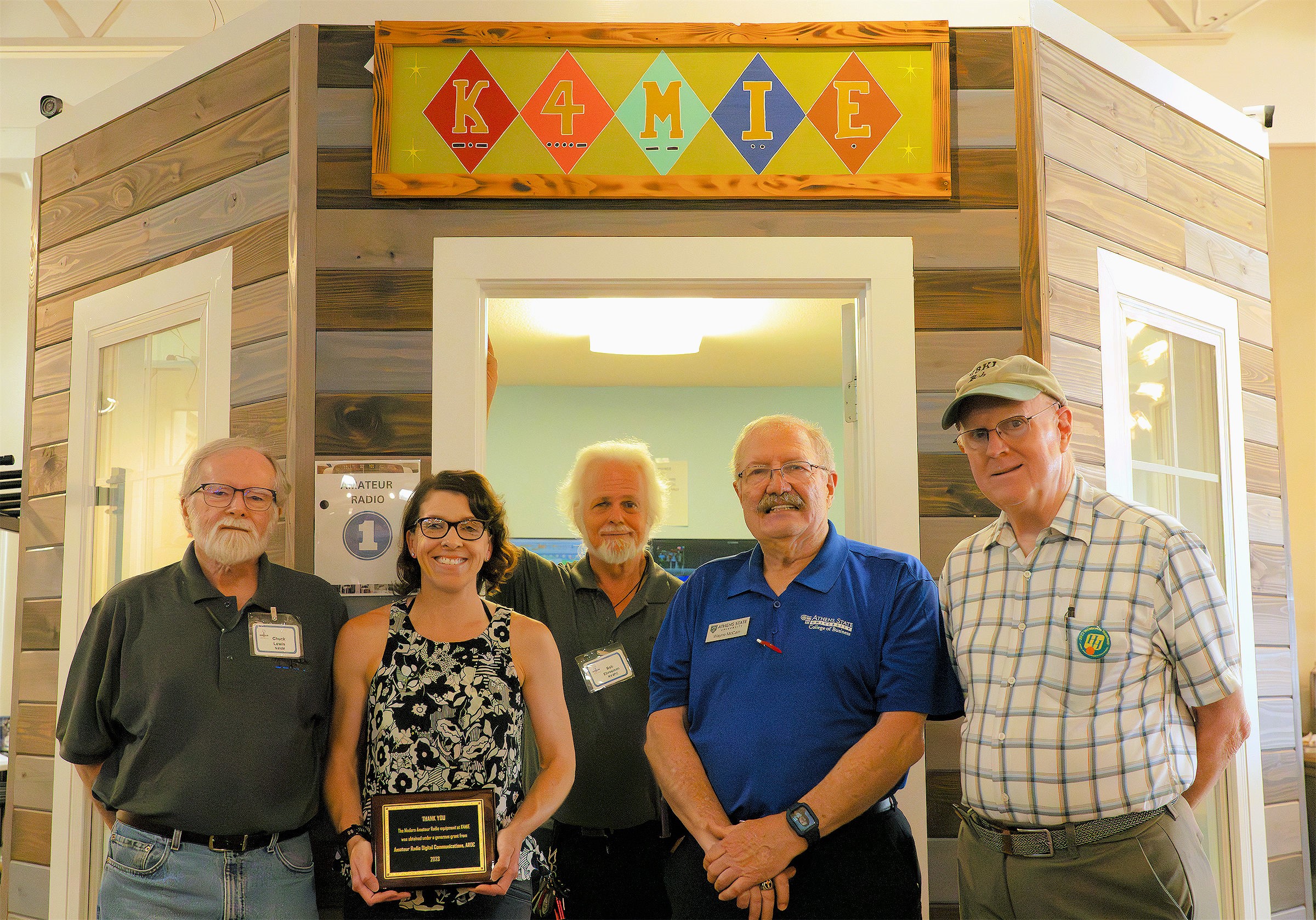 Rebecca Key (KO4KVG) outside of K4MIE with members of the Radio Club of SIGNALS: Museum of Information Explosion. L to R: Chuck Lewis (N4NM), Rebecca Key (KO4KVG), Bob Ehresman (KV4PC), Wayne McCain (W4CQD), Bob De Pierre (K8KI).