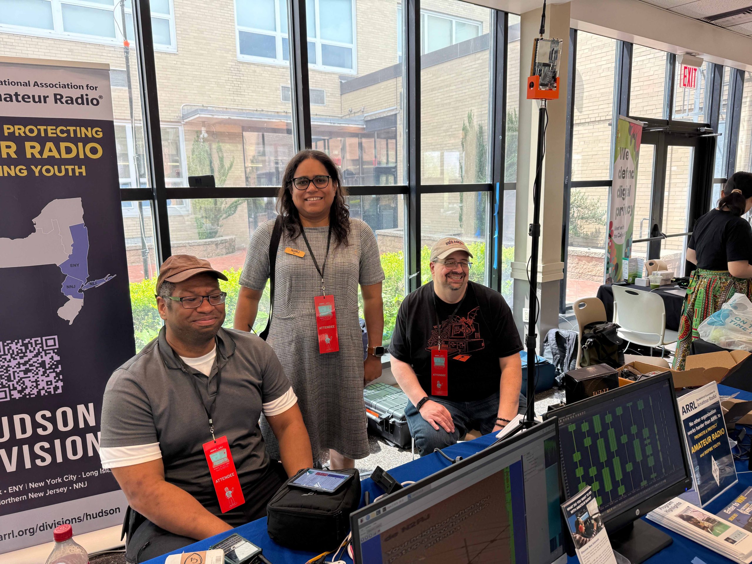 Ria Jairam N2RJ visiting the Ham Radio Village (K0HRV) at the HOPE_16 (Hackers on Planet Earth) conference
