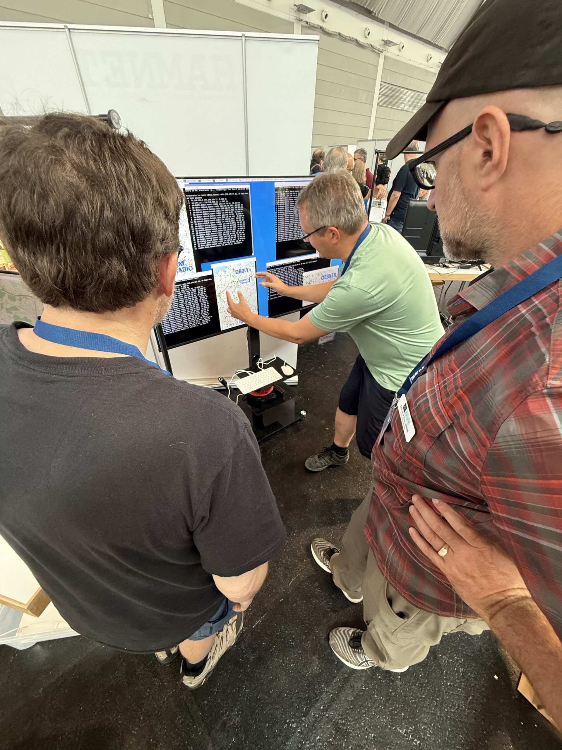 Left to Right: Adam Lewis KC7GDY, Jann Traschewski DG8NGN, and Schuyler Erle N0GIS at HAM RADIO 2025.
