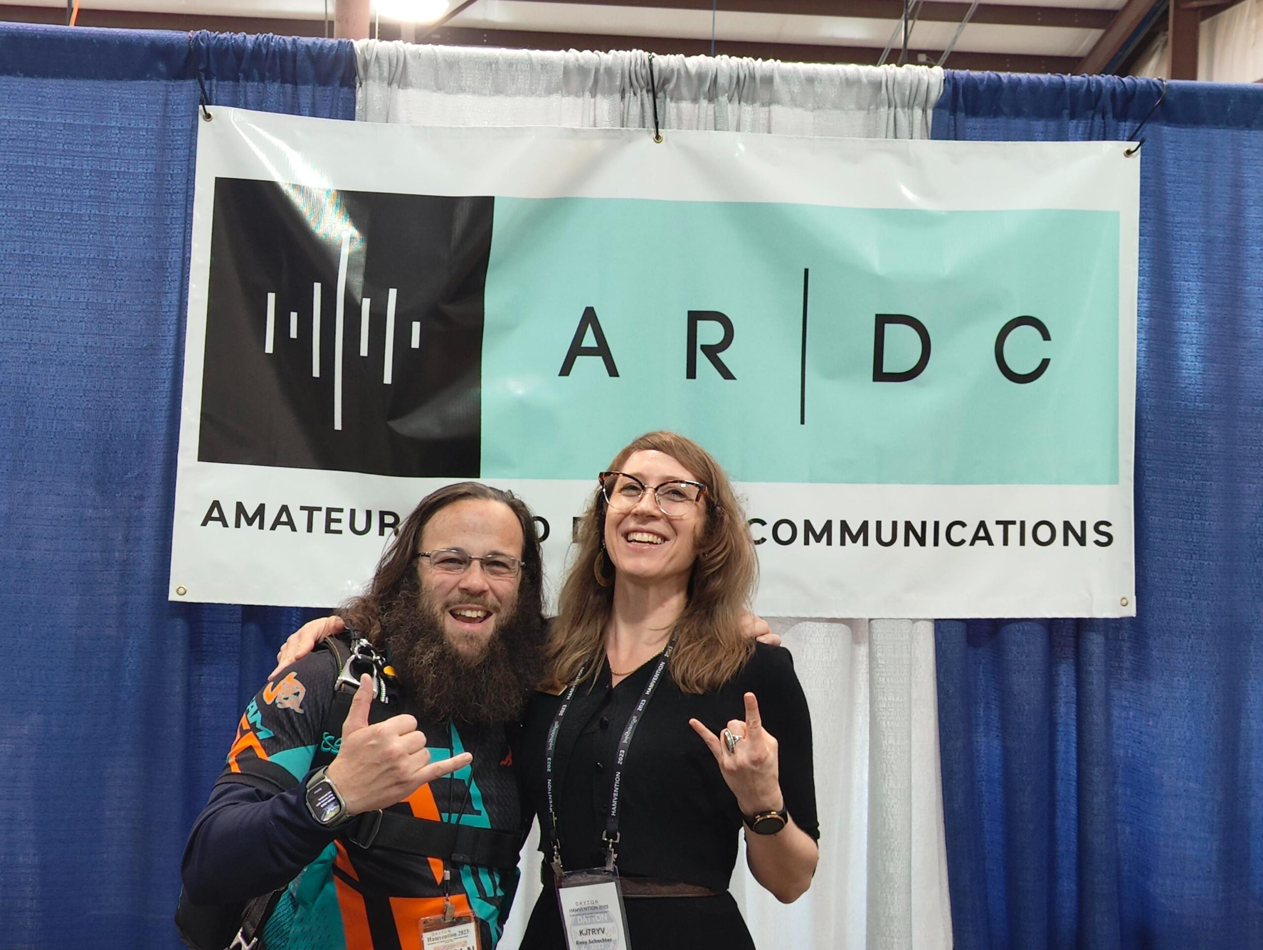 Rosy Schechter (KJ7RYV) with Carlos Felix Ortiz (KD9OLN) at the ARDC booth at Hamvention 2023