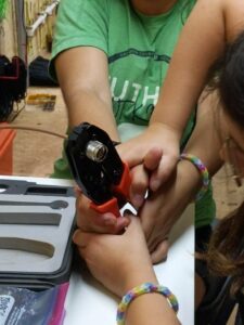 Member of the Fauquier County (VA) 4-H club crimping a coaxial connector