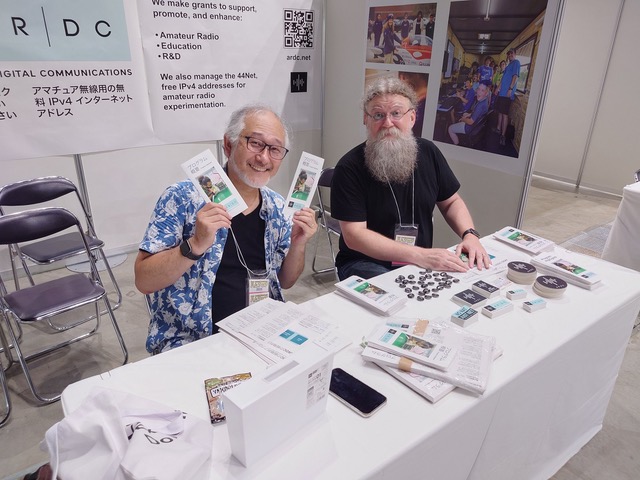 Taka Otsuka 7K2COL/K2COL and John Burwell KI5QKX at the JARL Ham Fair 2025, Tokyo, Japan