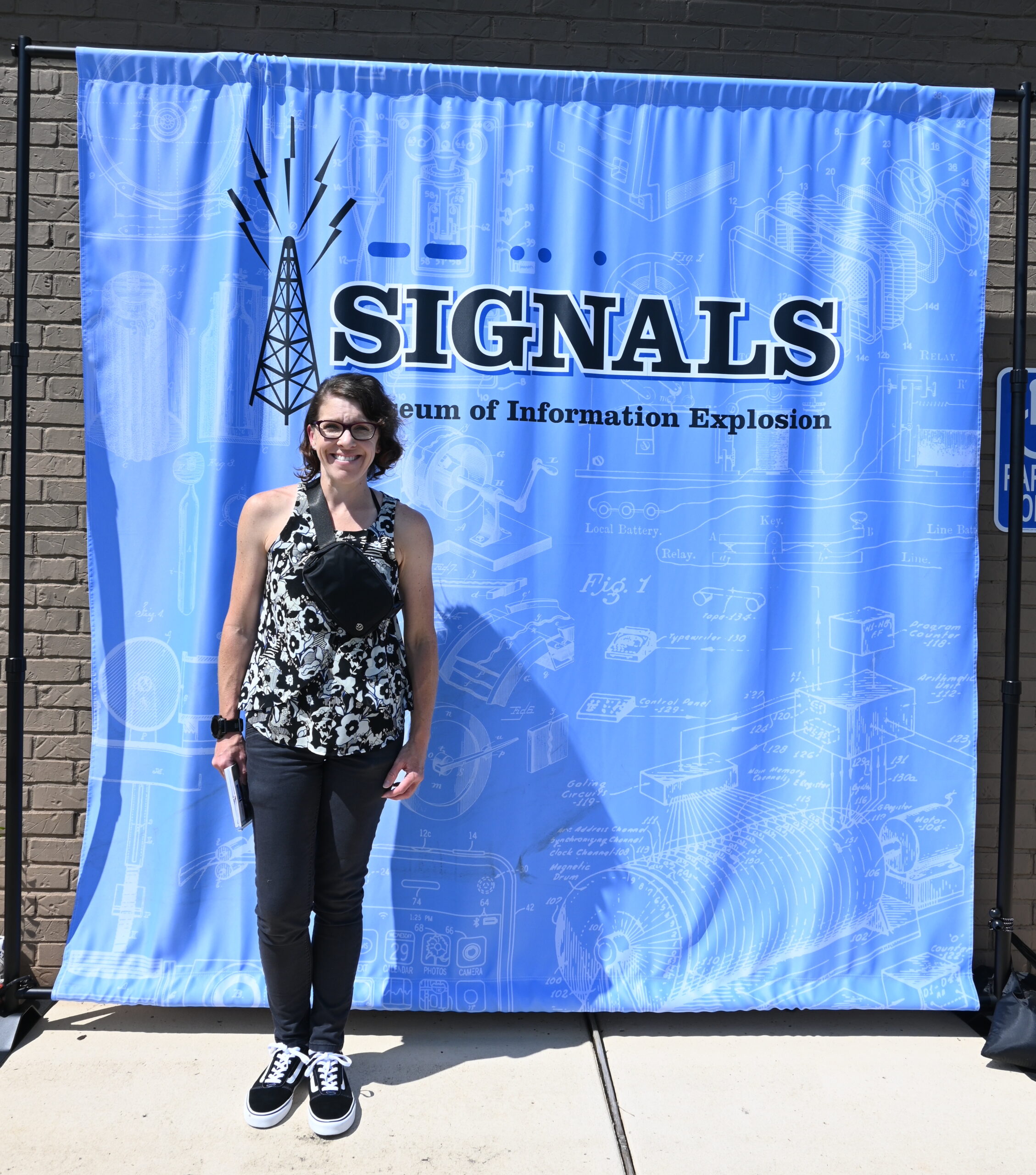 Rebecca Key (KO4KVG) outside of SIGNALS: Museum of Information Explosion