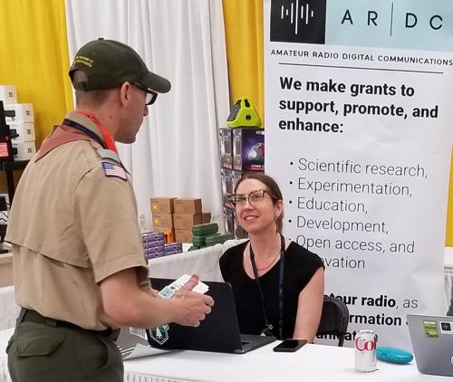 Rosy Schechter (KJ7RYV) at the ARDC booth at Orlando HamCation 2023