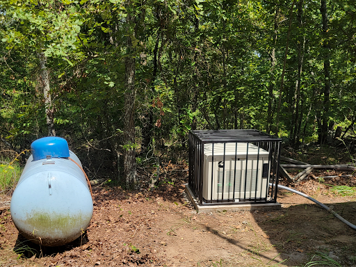 The Central Arkansas Radio Network's (CAREN's) propane-fueled 13 kW generator, equipped with a security cage